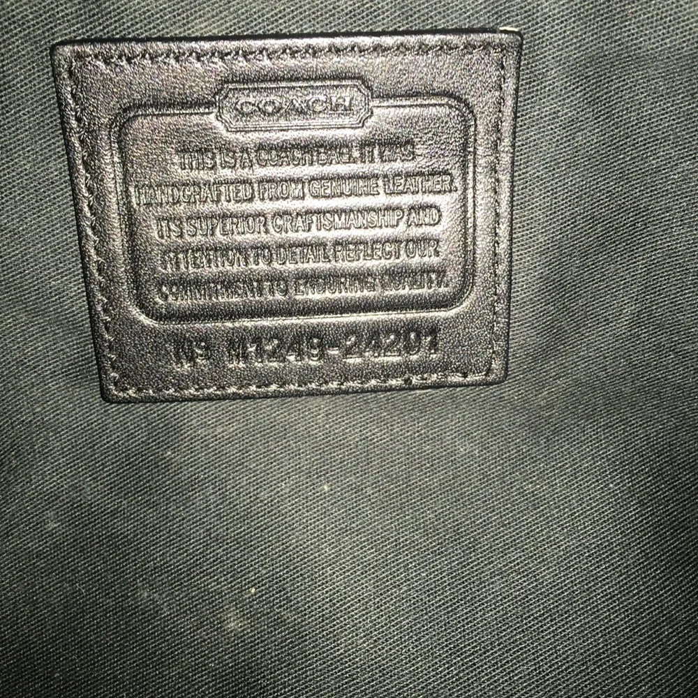 Coach Black Leather Tote with Tassel Detail